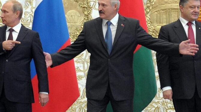 Putin, Lukaschenko und Poroschenko (v.l.n.r.) beschlossen, dass die Kontaktgruppe für die Ukraine-Krise nun regelmäßig in Min