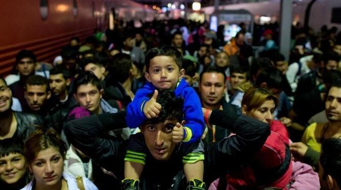 Flüchtlinge im September 2015 auf einem Bahnsteig im Münchner Hauptbahnhof. Foto: Sven Hoppe