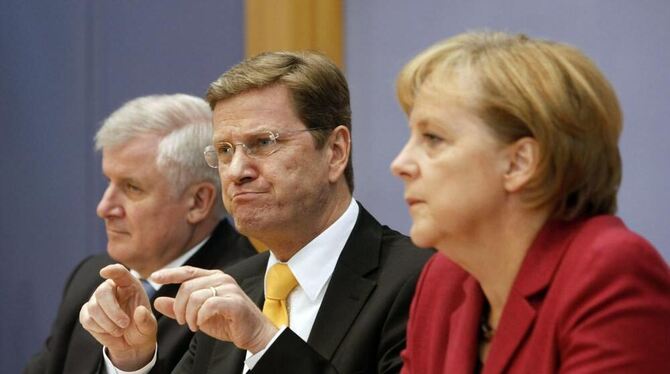 Horst Seehofer, Guido Westerwelle und Angela Merkel.