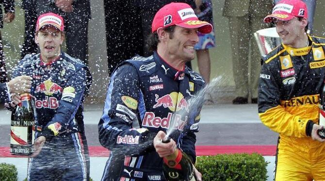 Vettel (l) und Webber (M) jubeln über einen Doppelerfolg in Monaco.