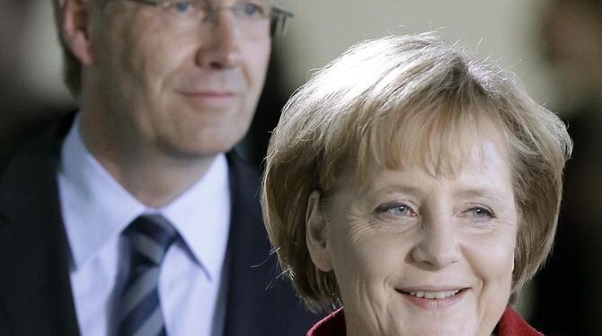 Bundeskanzlerin Angela Merkel mit Christian Wulff.