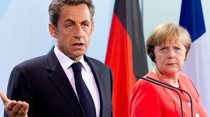 Frankreichs Präsident Sarkozy und Kanzlerin Merkel während eines Treffens Mitte Juni in Berlin.