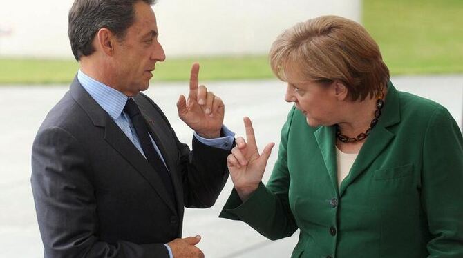 Frankreichs Präsident Nicolas Sarkozy und Bundeskanzlerin Angela Merkel (CDU) im Juli in Berlin.