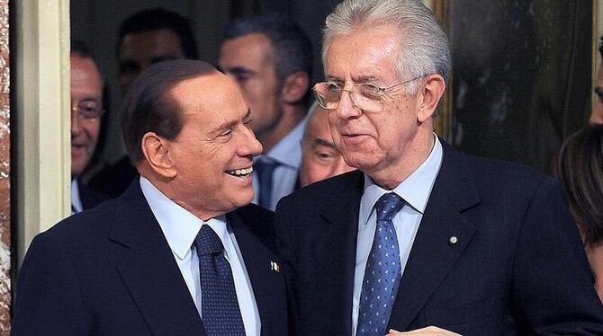 Mario Monti (r) folgt Silvio Berlusconi als italienischer Ministerpräsident. Foto: Maurizio Brambatti