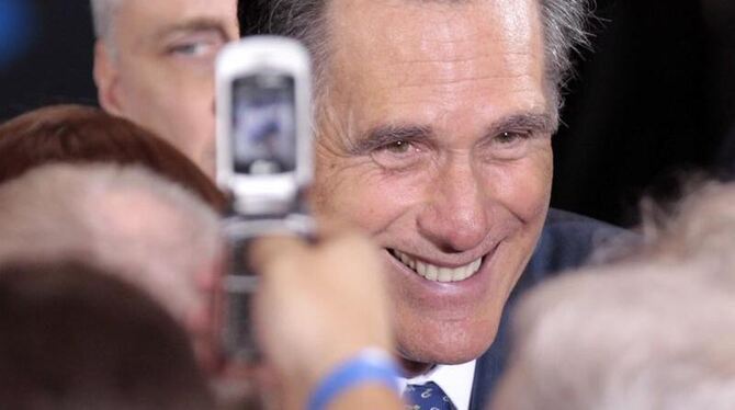 Mitt Romney feiert. Foto: Jeff Kowalsky