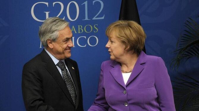 Chiles Präsident Sebastian Pinera und Kanzlerin Angela Merkel treffen sich in Los Cabos. Foto: Chile Presidency