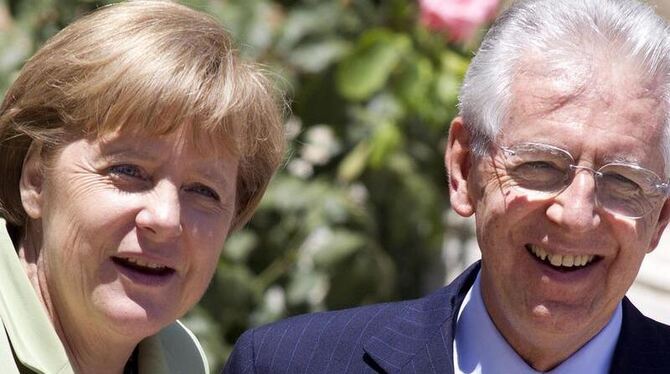 Kanzlerin Merkel und Ministerpräsident Monti bei einem früheren Treffen in der Villa Madama in Rom. Foto: Alessandro di Meo/