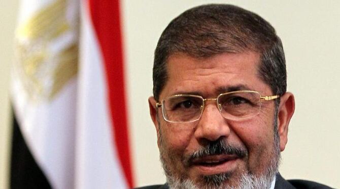 Ägyptens Präsident Mursi legt sich mit dem Militärrat und Verfassungsgericht an. Foto: Khaled Elfiqi