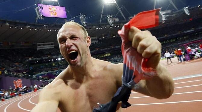 Robert Harting brüllt seine Freude heraus. Foto: Kerim Okten