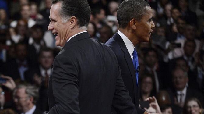 Nach dem dritten TV-Duell gehen Mitt Romney (l) und Barack Obama wieder getrennte Wege. Foto: Michael Reynolds