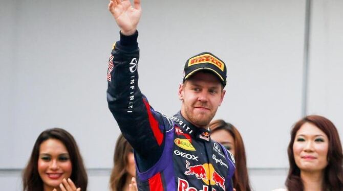 Nicht ganz so ausgelassen kam Sebastian Vettel zur Siegerehrung aufs Podest. Foto: Diego Azubel