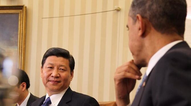 Präsident Barack Obama und Xi Jinping bei einem früheren Treffen. Foto: Martin H. Simon/Archiv