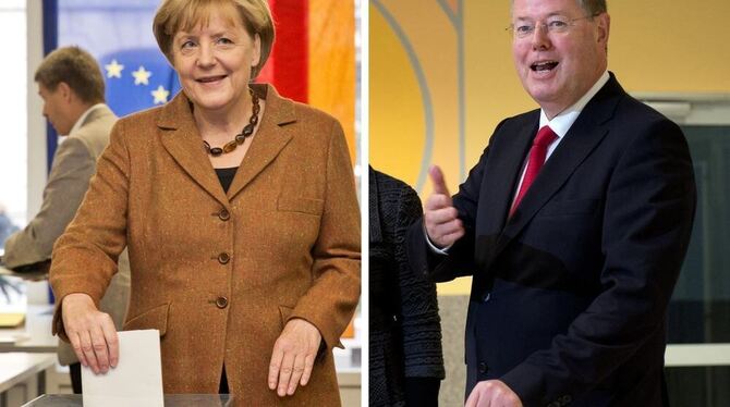 Kanzlerin Angela Merkel (CDU) und Herausforderer Peer Steinbrück (SPD) bei der Stimmabgabe.