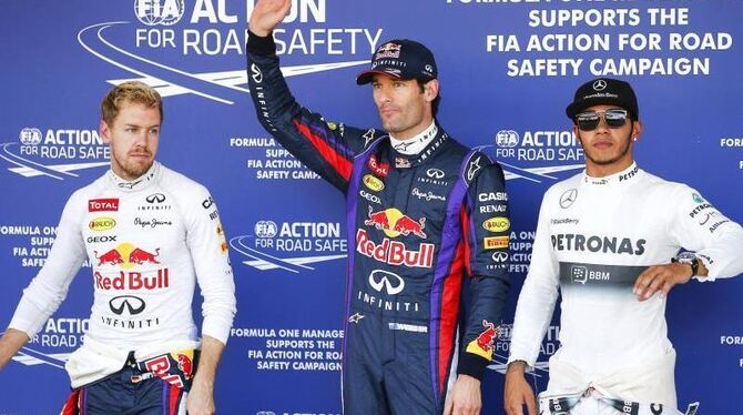 Sebastian Vettel steht als Zweiter der Qualifikation neben Mark Webber. Foto: Diego Azubel