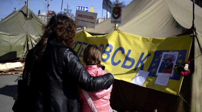 Zelte auf dem Maidan in Kiew: Nach den Unruhen und dem Verlust der Krim drohen den Ukrainern jetzt Arbeitslosigkeit und Armut