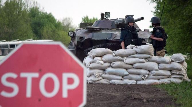 Ukrainische Regierungstruppen bei einen Angriff auf die prorussischen Milizen im Osten des Landes.