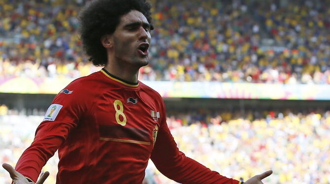 Belgiens Marouane Fellaini jubelt über seinen Treffer zum 1:1 gegen Algerien. FOTO: DPA