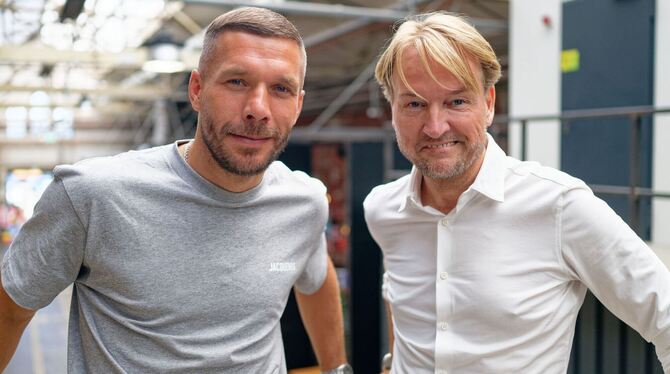 Interview mit Fußballprofi Podolski und Musikmanager Krampe