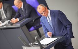 Friedrich Merz wirft Olaf Scholz vor, das Land zu spalten. 