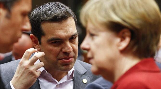 Viel zu besprechen: Griechenlands Premier Alexis Tsipras und Angela Merkel in Brüssel. Foto: Olivier Hoslet