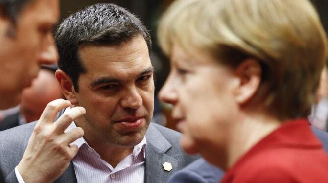 Alexis Tipras und Angela Merkel vergangene Woche beim EU-Gipfel in Brüssel. Foto: Olivier Hoslet