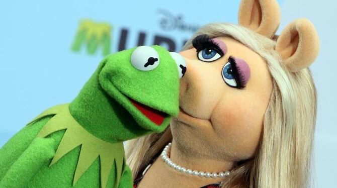 Miss Piggy und Kermit der Frosch 2014 bei einem Fototermin in Berlin. Foto: Stephanie Pilick