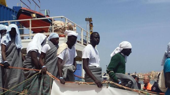 Gerettete Flüchtlinge bei ihrer Ankunft auf der italienischen Mittelmeerinsel Lampedusa. Foto: Elio Desiderio