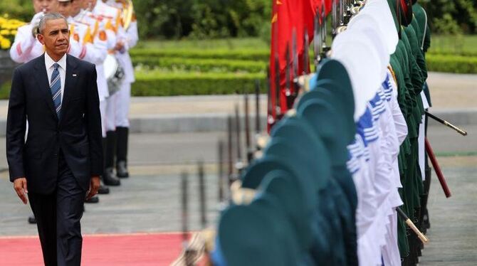 US-Präsident Barack Obama wird bei seinem ersten offiziellen Besuch in Vietnam begrüßt. Foto: Luong Thai Linh